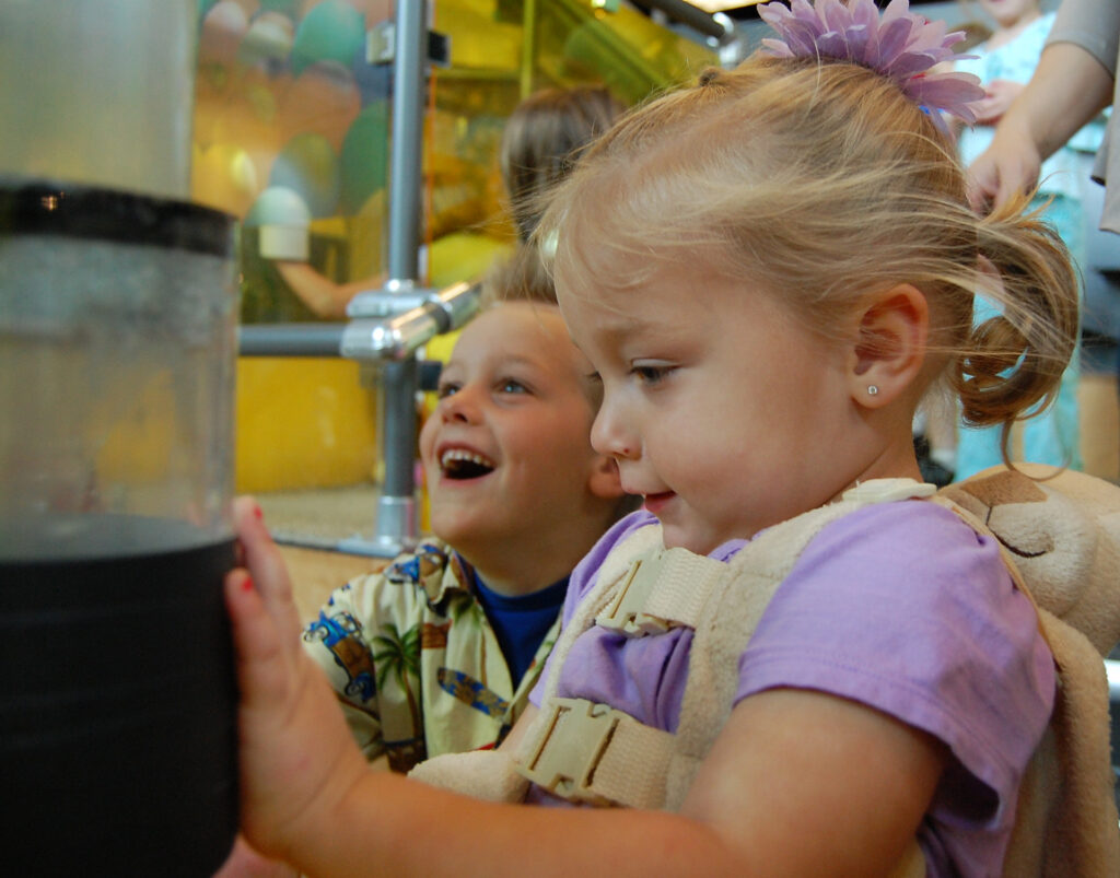 Mother and son looking at Garden amazement Exhibit