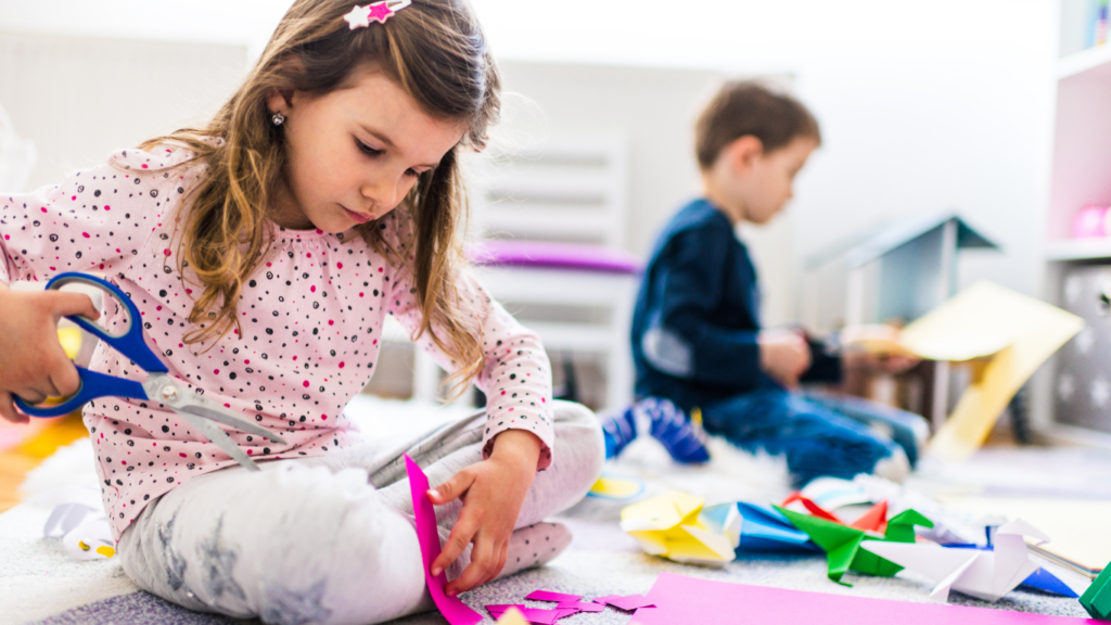 Kids cutting colored paper