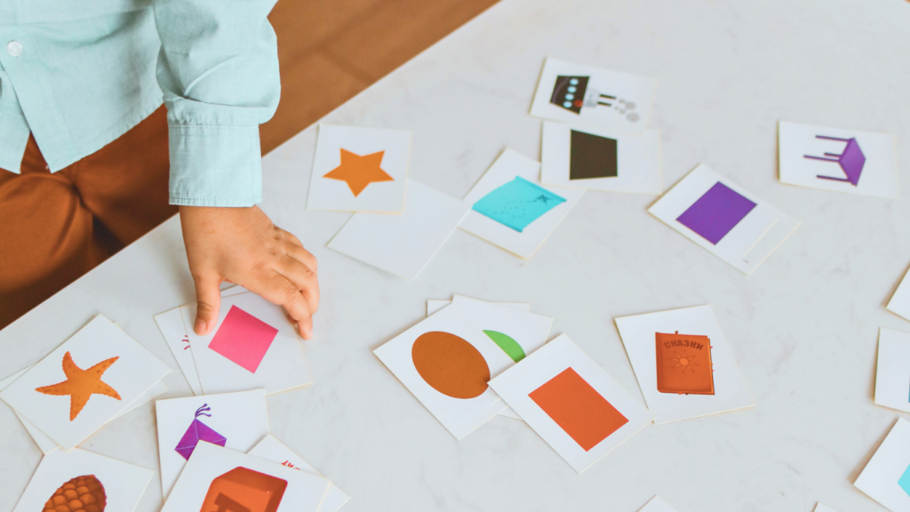 Kids playing games to match shapes