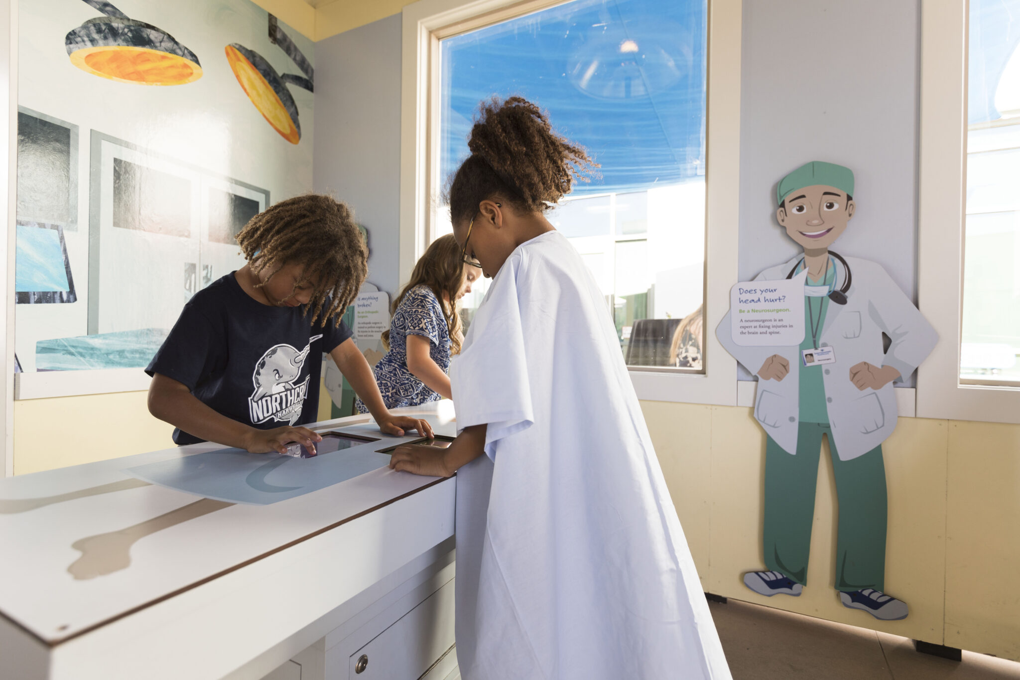 Kids playing as doctors at the museum