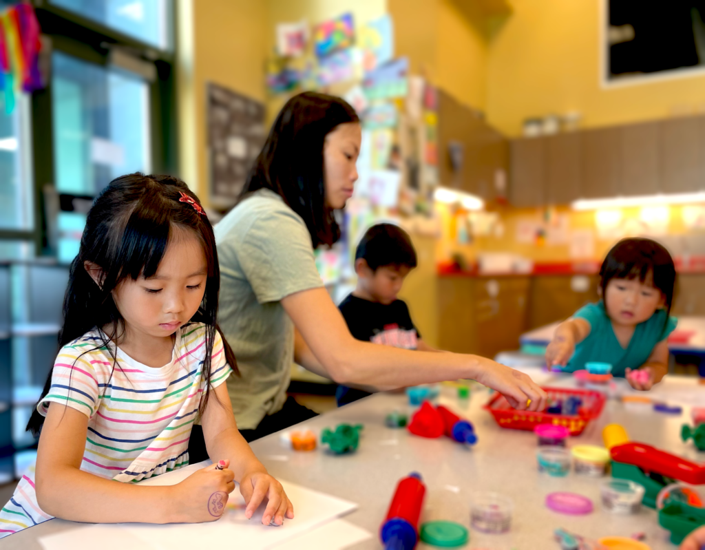 Kids and mother doing arts at Museum's Art Studio